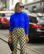 Women's Chunky Knit Sweater with Fringed Hem and High Collar