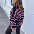 Women's Cozy Knit Sweater with Cable Knit Pattern and Graphic Accents
