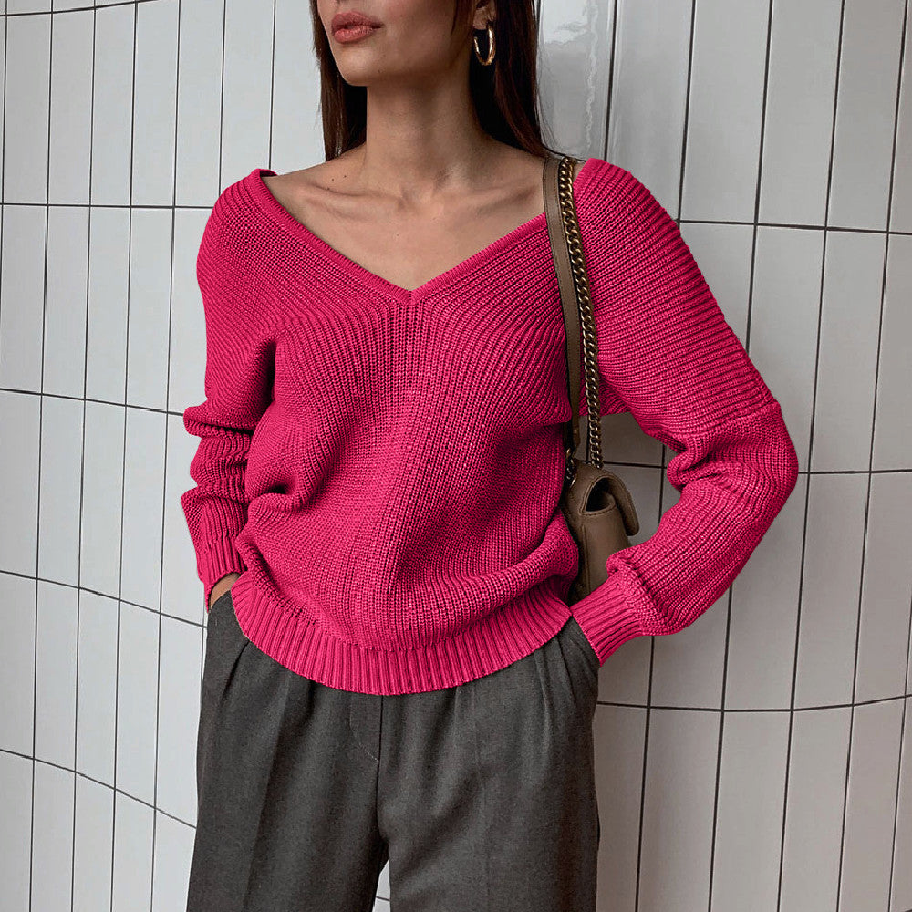 Elegant V-Neck Sweater with Fine Ribbed Texture and Drop Shoulders