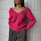 Elegant V-Neck Sweater with Fine Ribbed Texture and Drop Shoulders