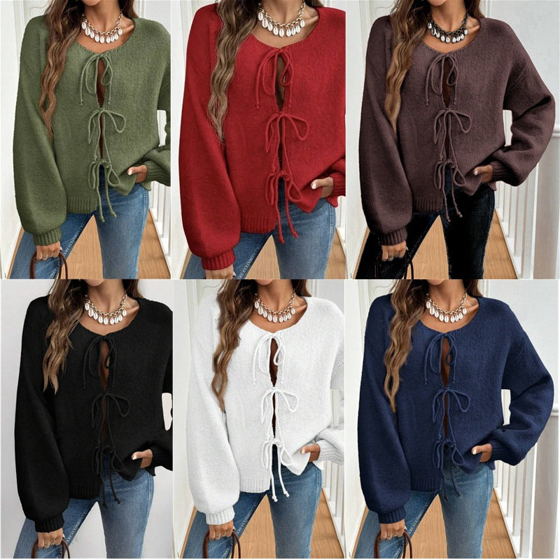 Women's Cozy Knit Sweater with Decorative Lace-Up Detail and Wide Sleeves