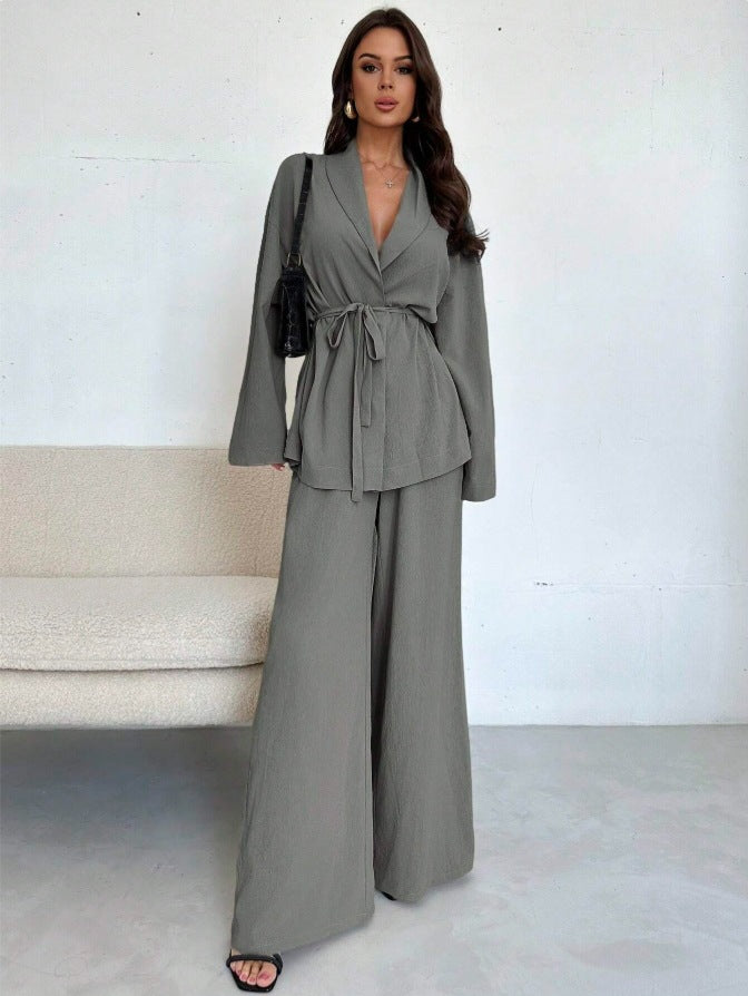 Elegant Women's Oversized Jumpsuit with Waist Belt and Wide Leg