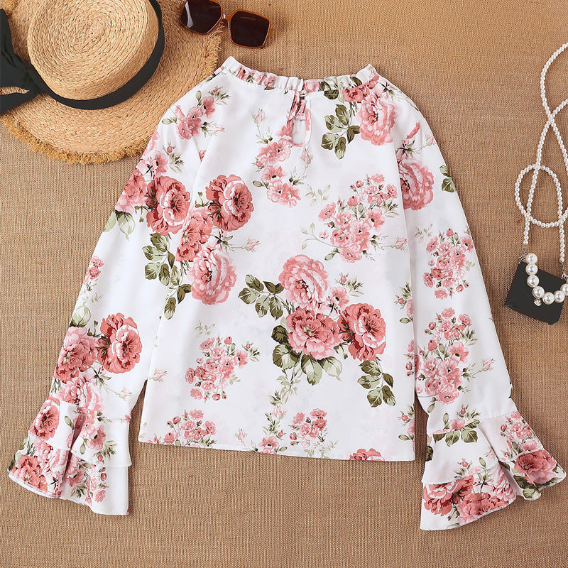 Women's Blouse with Ruffle Details and Floral Pattern