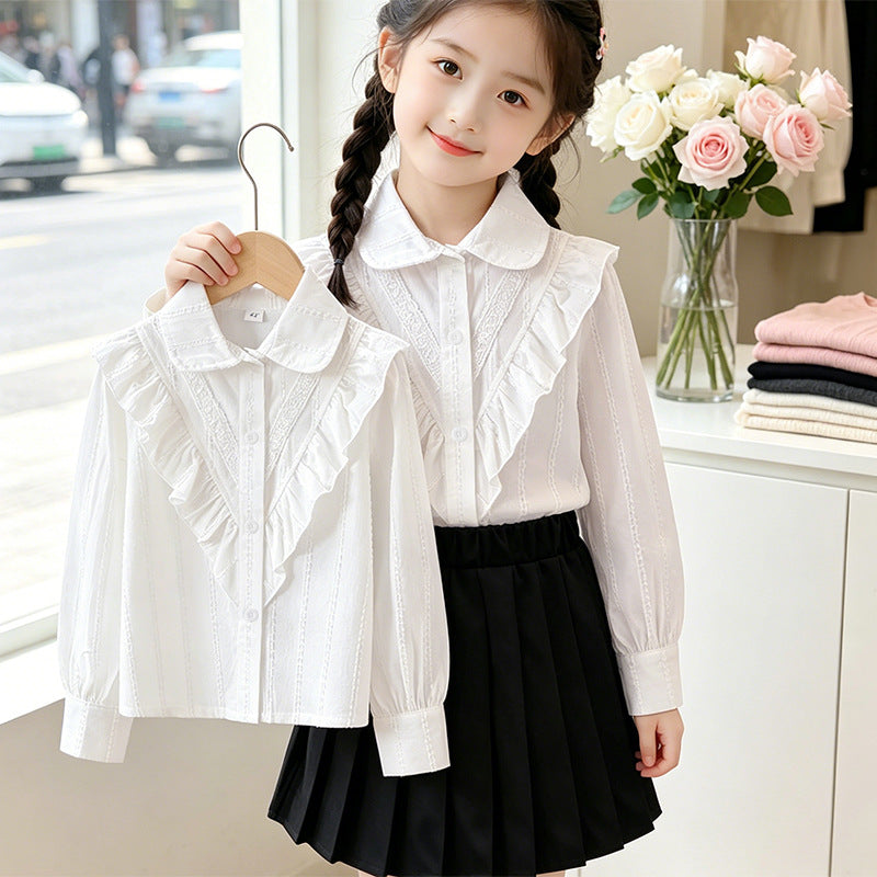 Women's Blouse with Ruffle Details and Fine Embroidery