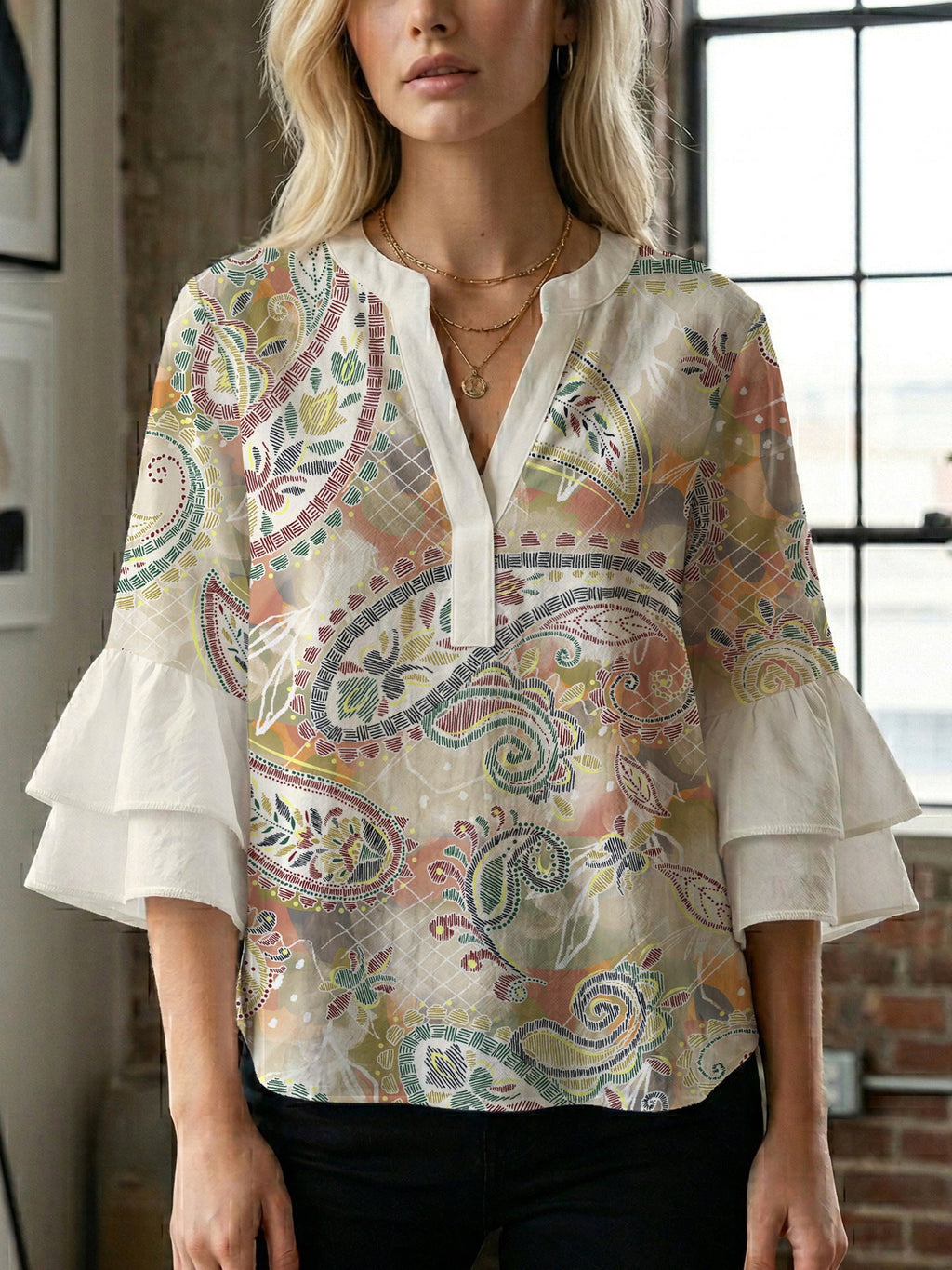 Women's Blouse with Voluminous Ruffle Sleeves and Floral Design