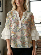 Women's Blouse with Voluminous Ruffle Sleeves and Floral Design