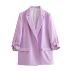 Women's Elegant Blazer with Structured Sleeves and Gold Accents
