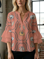 Women's Blouse with Voluminous Ruffle Sleeves and Floral Design
