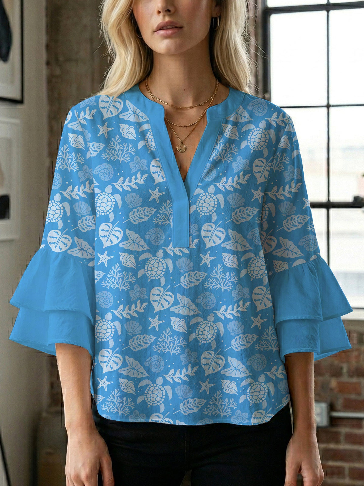 Women's Blouse with Voluminous Ruffle Sleeves and Modern Print