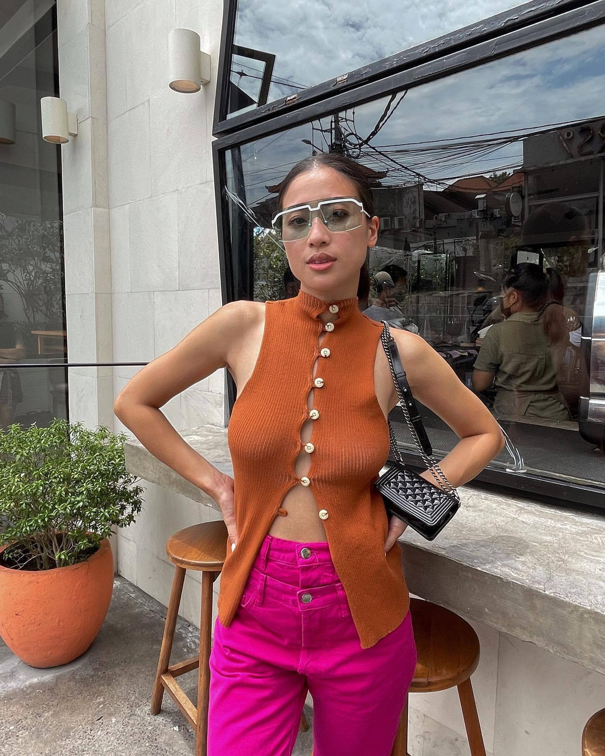 Women's Sleeveless Knit Top with Unique Button Placket
