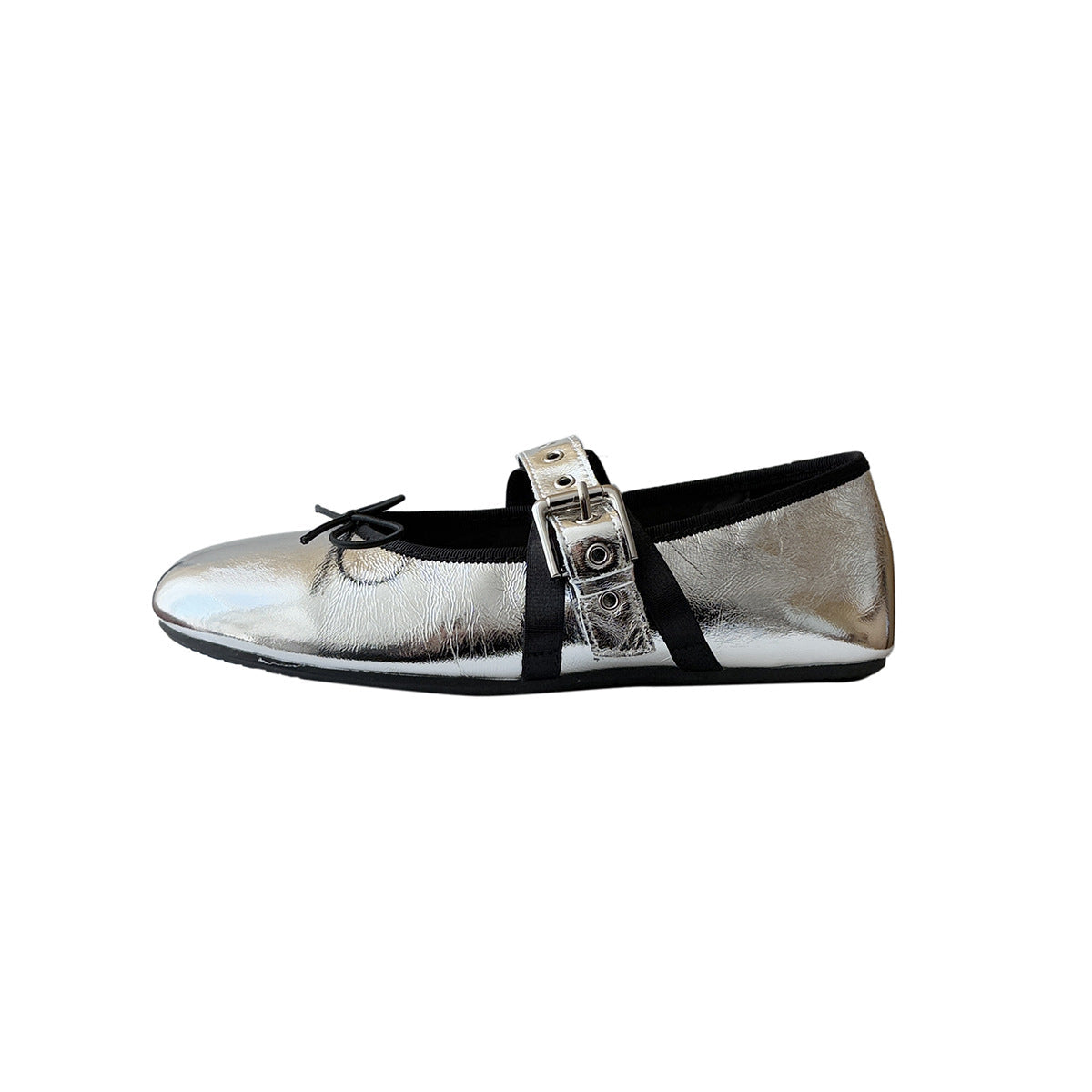 Women's ballet flats with decorative strap and shimmering metallic look