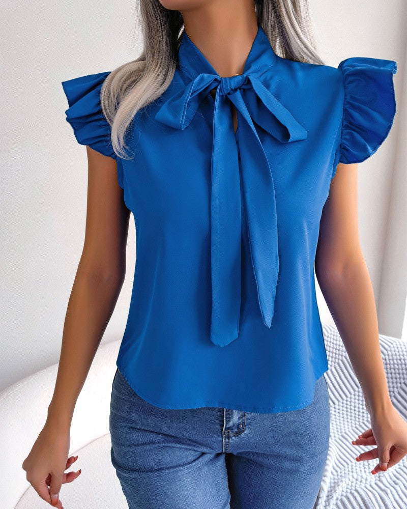Women's Blouse with Ruffle Details and Chic Bow Element