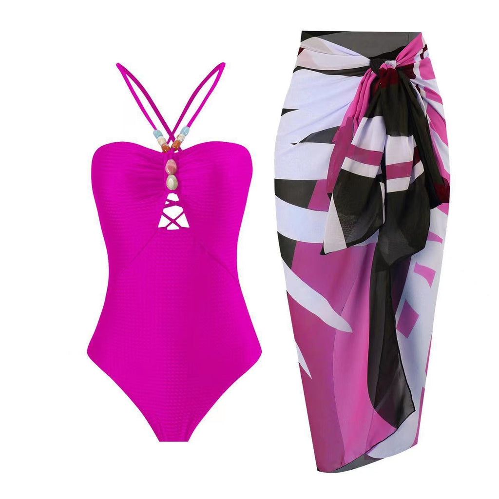 Women's Swimsuit with Elegant Wrap Skirt and Decorative Details