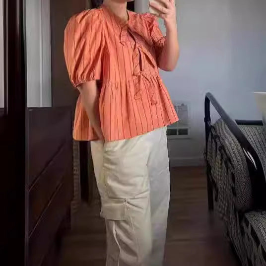 Women's Blouse with Ruffles and Bow Accents