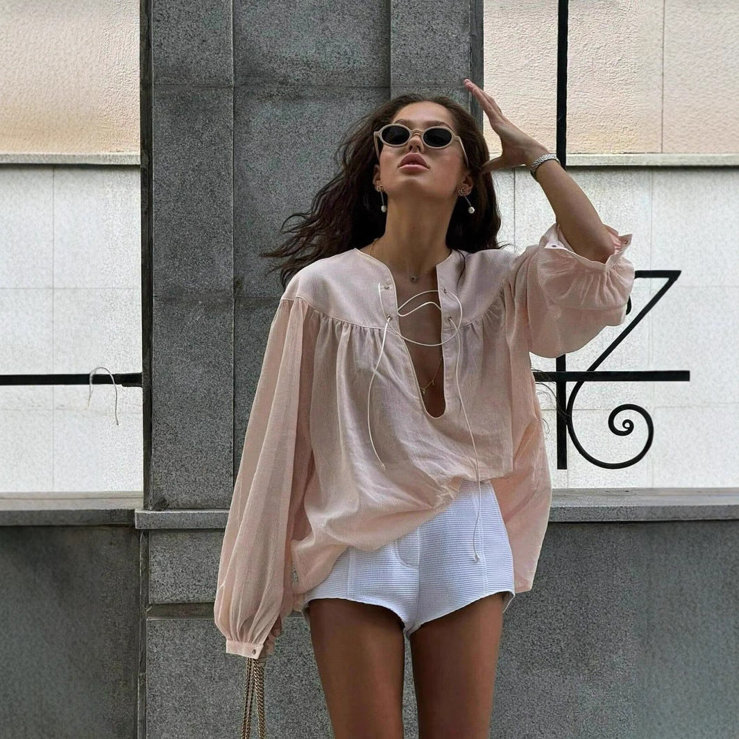 Airy Blouse with Ruffle Details and Decorative Lacing
