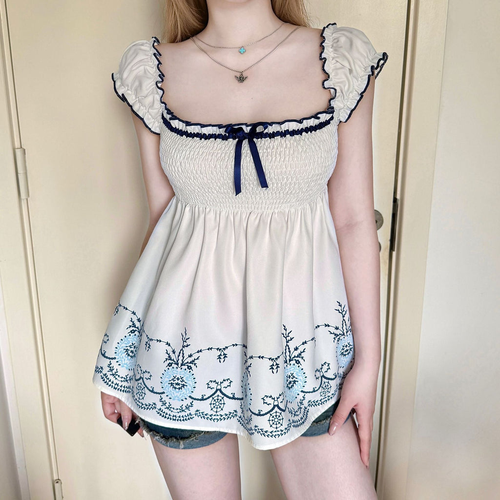 Women's Cotton Blouse with Floral Embroidery and Ruffled Hem