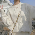 Women's Chunky Knit Sweater with Cable Design and Wide Cut