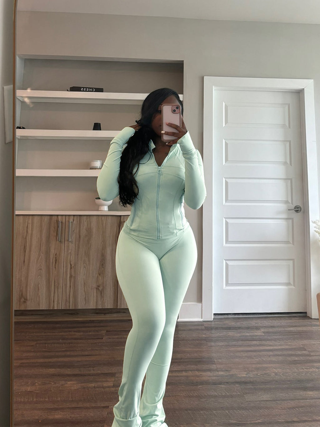 Figure-Hugging Tracksuit with Zipper and Flared Leg