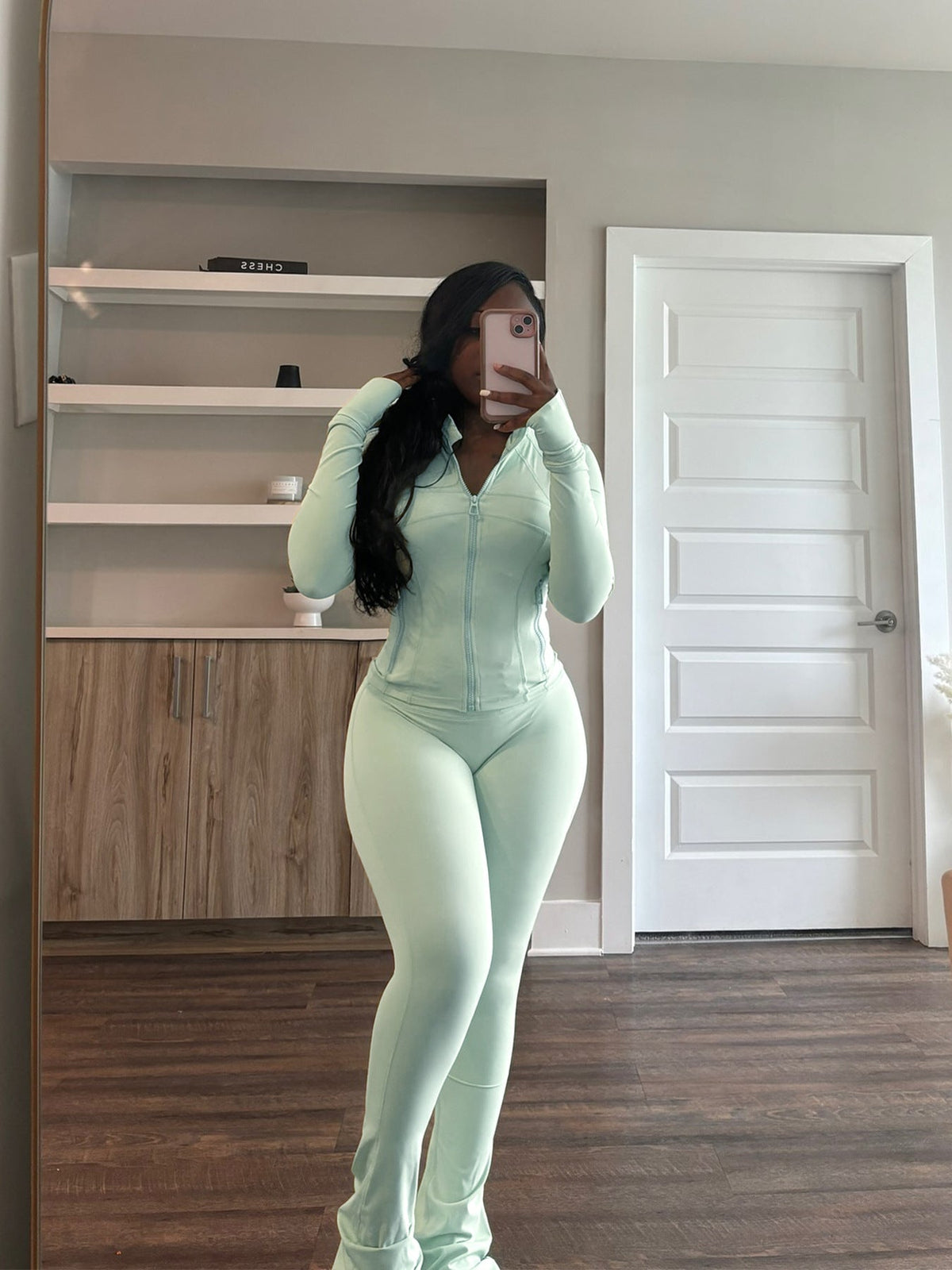 Figure-Hugging Tracksuit with Zipper and Flared Leg
