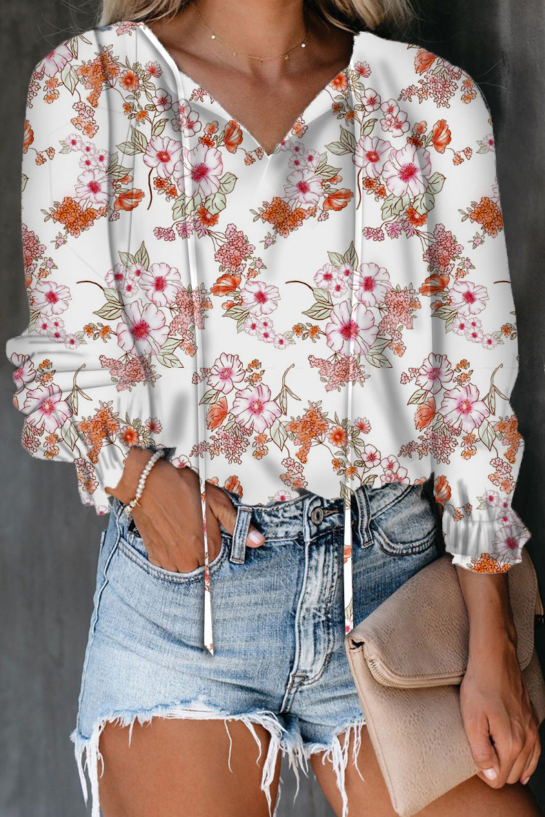 Women's Blouse with Floral Pattern and Loose Sleeves