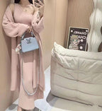 Women's Elegant Knit Coat with Wide Cut and Practical Pockets