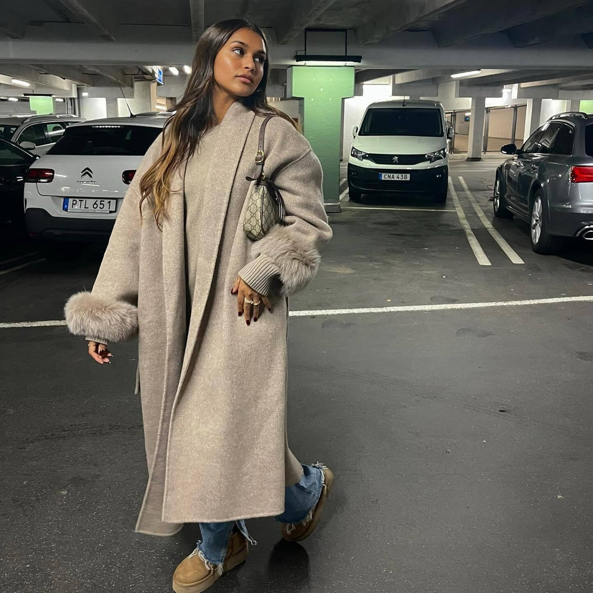 Elegant Long Jacket with Detachable Sleeves