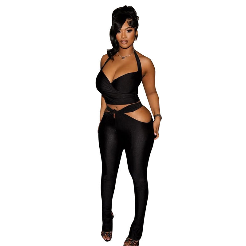 Elegant Outfit with Form-Fitting Pants and Seductive Top