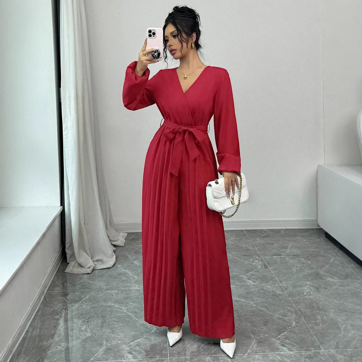 Elegant Jumpsuit with Adjustable Belt and Pleated Cut