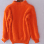 Women's fluffy turtleneck pullover with puff sleeves and textured design