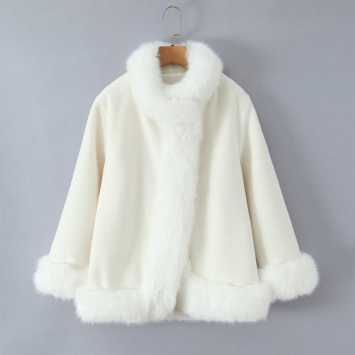 Elegant Faux Fur Jacket with Soft Collar and Modern Details