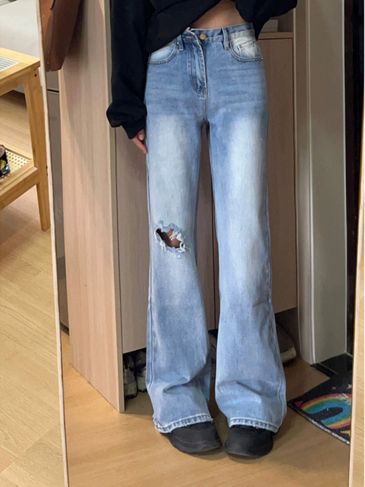 Women's High-Waisted Flared Jeans with Distressed Details