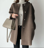 Elegant Oversized Wool Coat with Double-Button Closure and Side Pockets