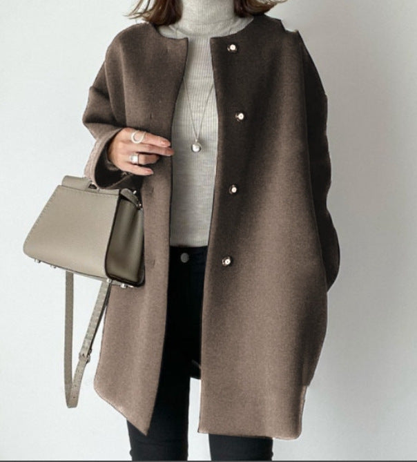 Elegant Oversized Wool Coat with Double-Button Closure and Side Pockets