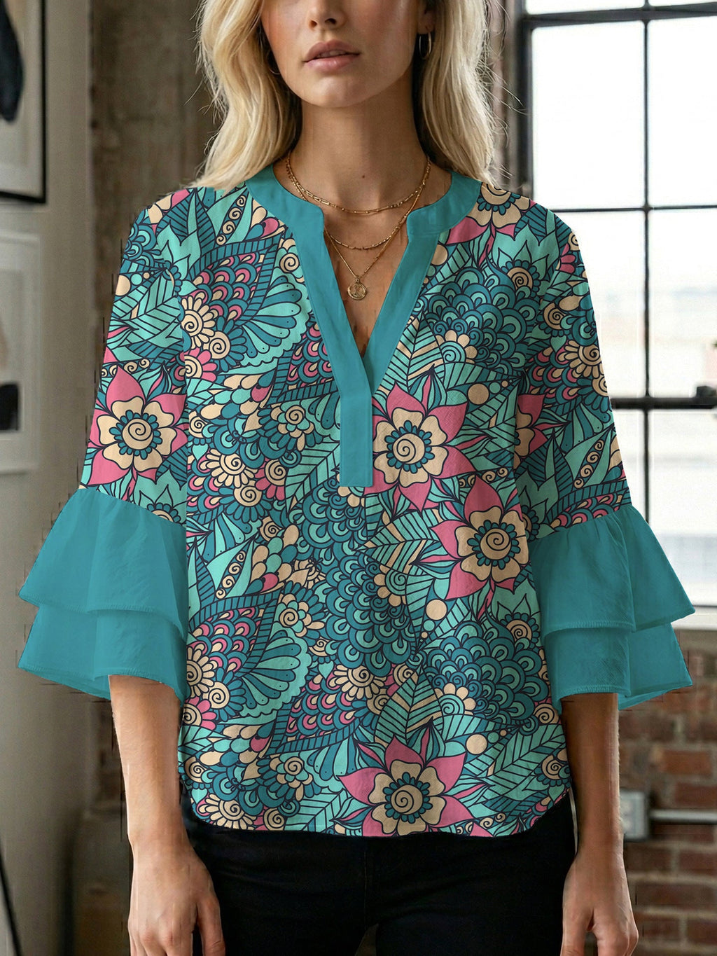 Women's Blouse with Voluminous Ruffle Sleeves and Floral Design