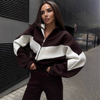 Women's athleisure two-piece made of heavy neoprene fleece with geometric dividing seams and high waist