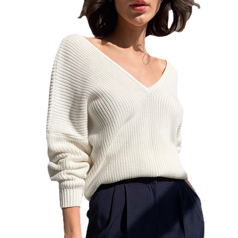 Elegant V-Neck Sweater with Fine Ribbed Texture and Drop Shoulders