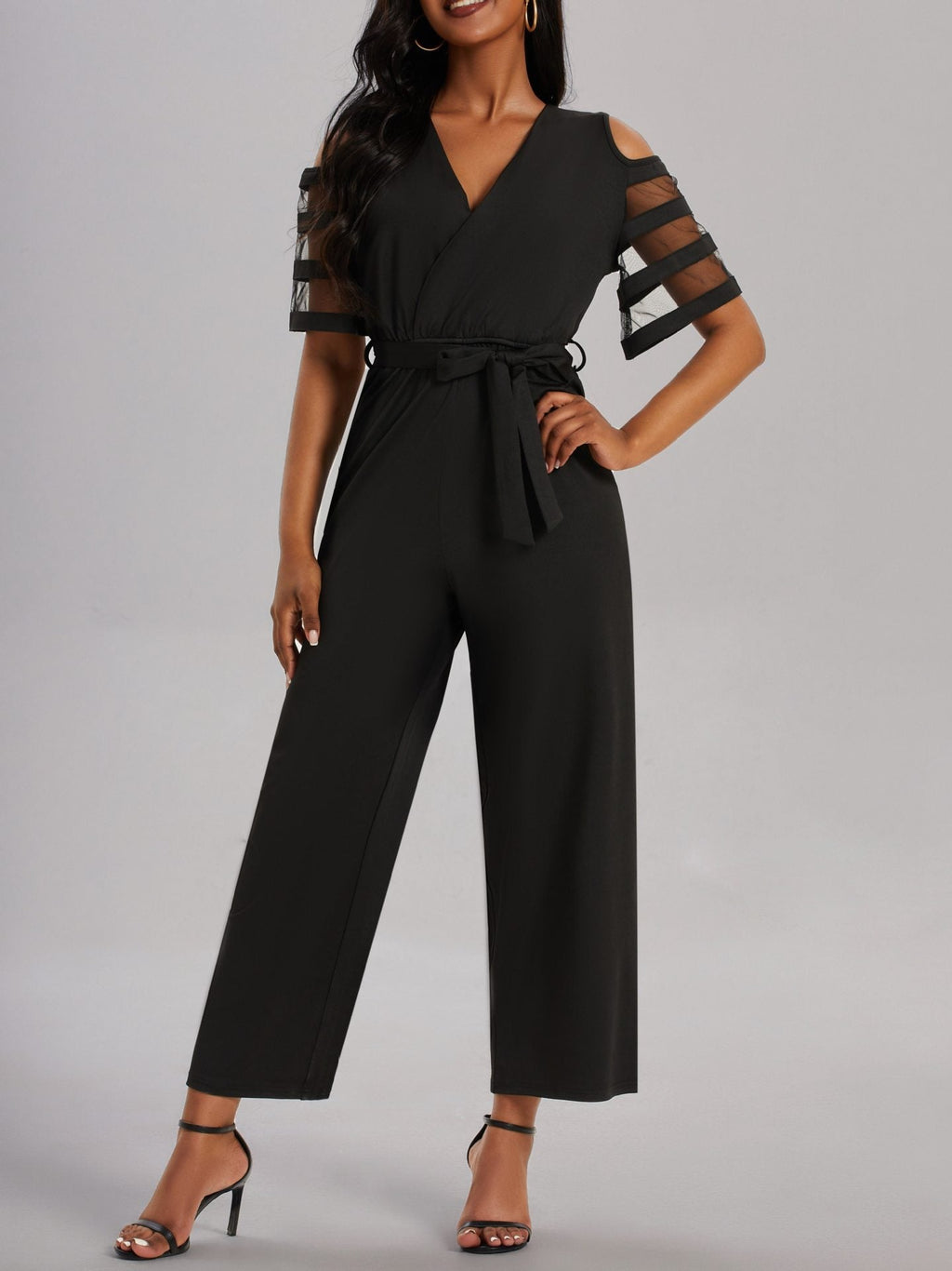 Elegant Jumpsuit with Sheer Sleeve Details and Waist Belt