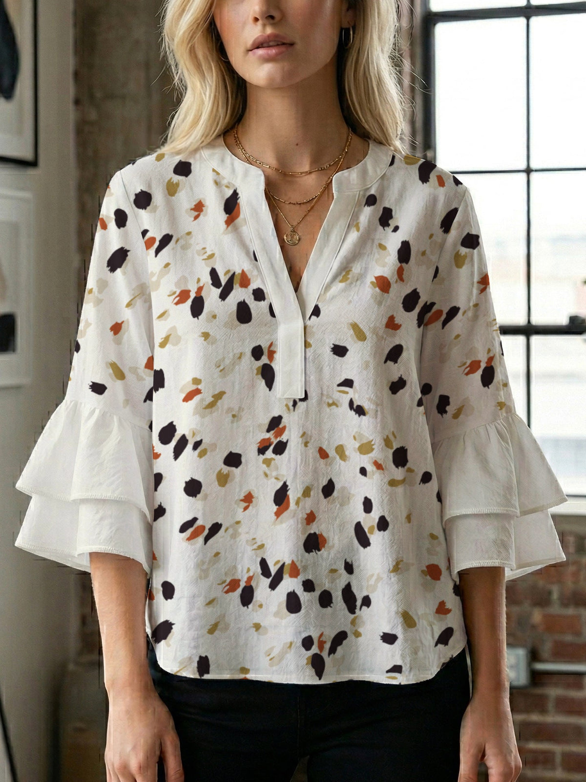 Women's Blouse with Voluminous Ruffle Sleeves and Modern Print
