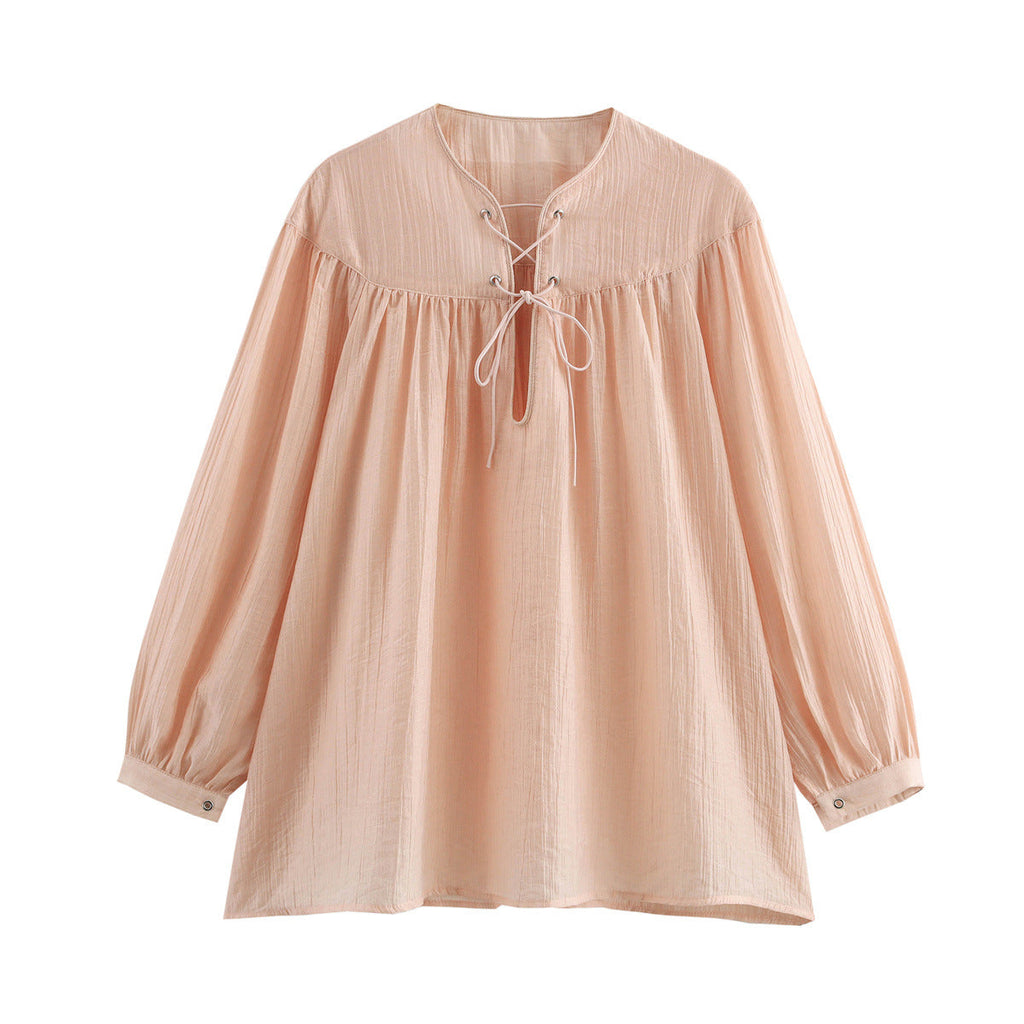 Airy Blouse with Ruffle Details and Decorative Lacing