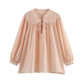 Airy Blouse with Ruffle Details and Decorative Lacing