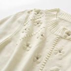 Women's Elegant Knit Sweater with Floral Design