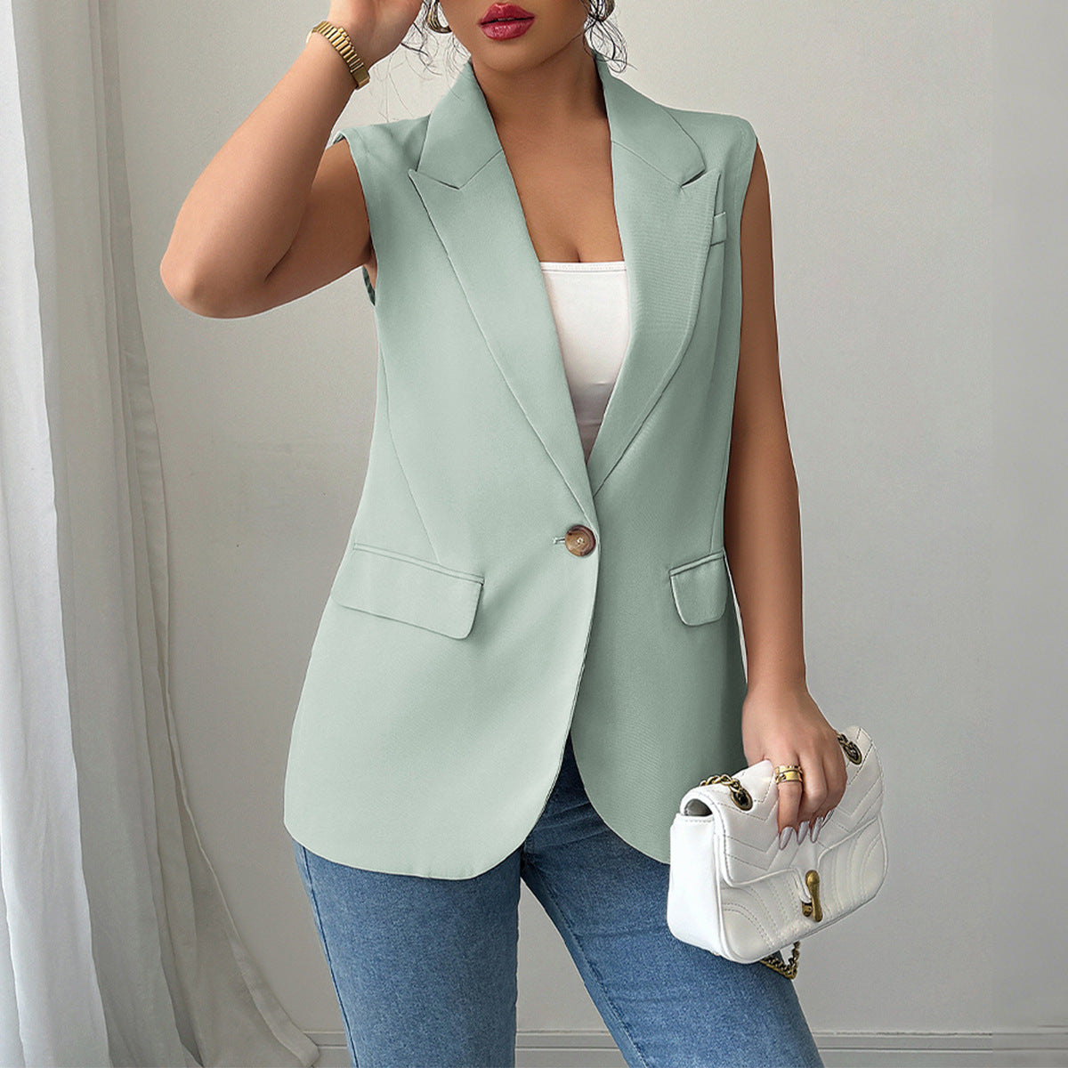 Women's Elegant Sleeveless Blazer with Fine Details