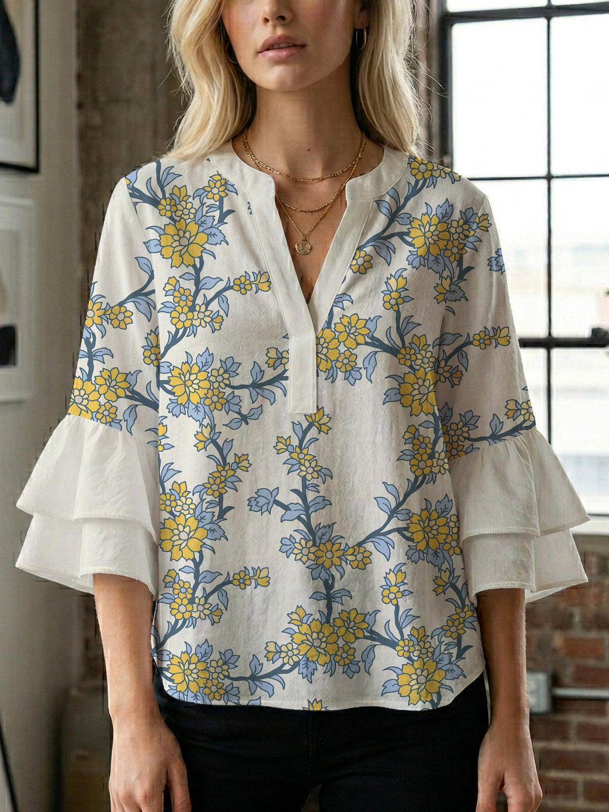 Women's Blouse with Voluminous Sleeves and Floral Design