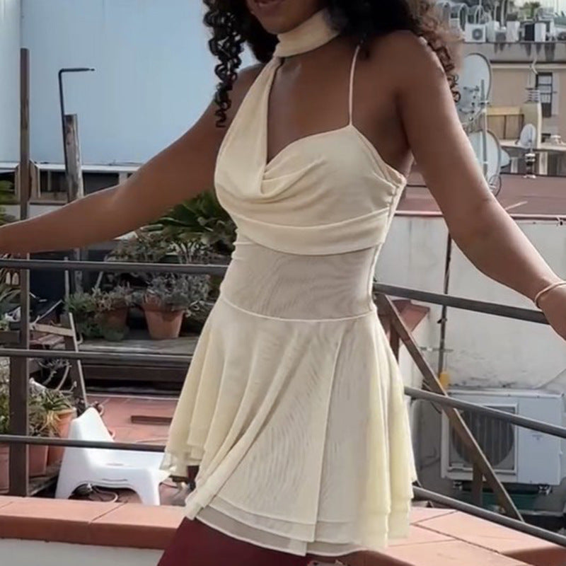 Elegant Asymmetrical Mini Dress with Decorative Shoulder Strap and Flowing Hem