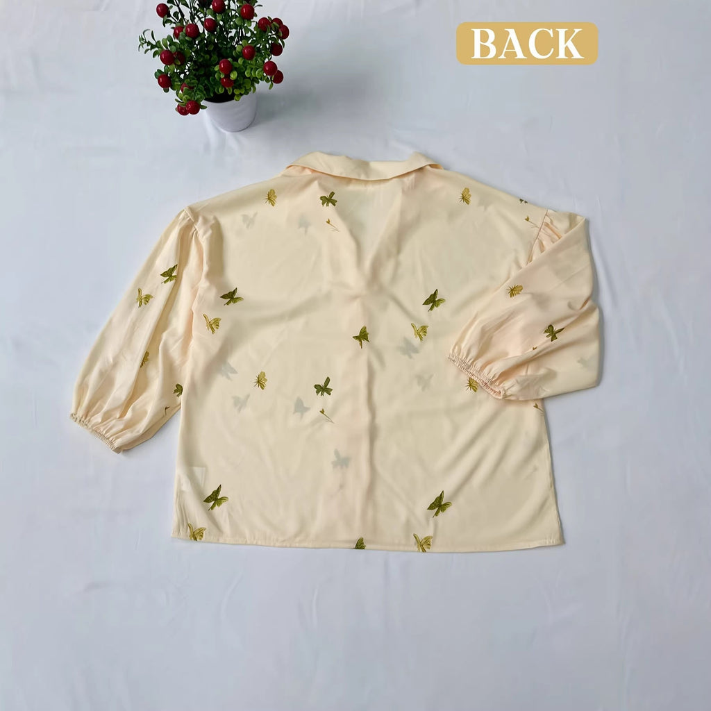 Women's Blouse with Ruffle Details and Floral Embroidery