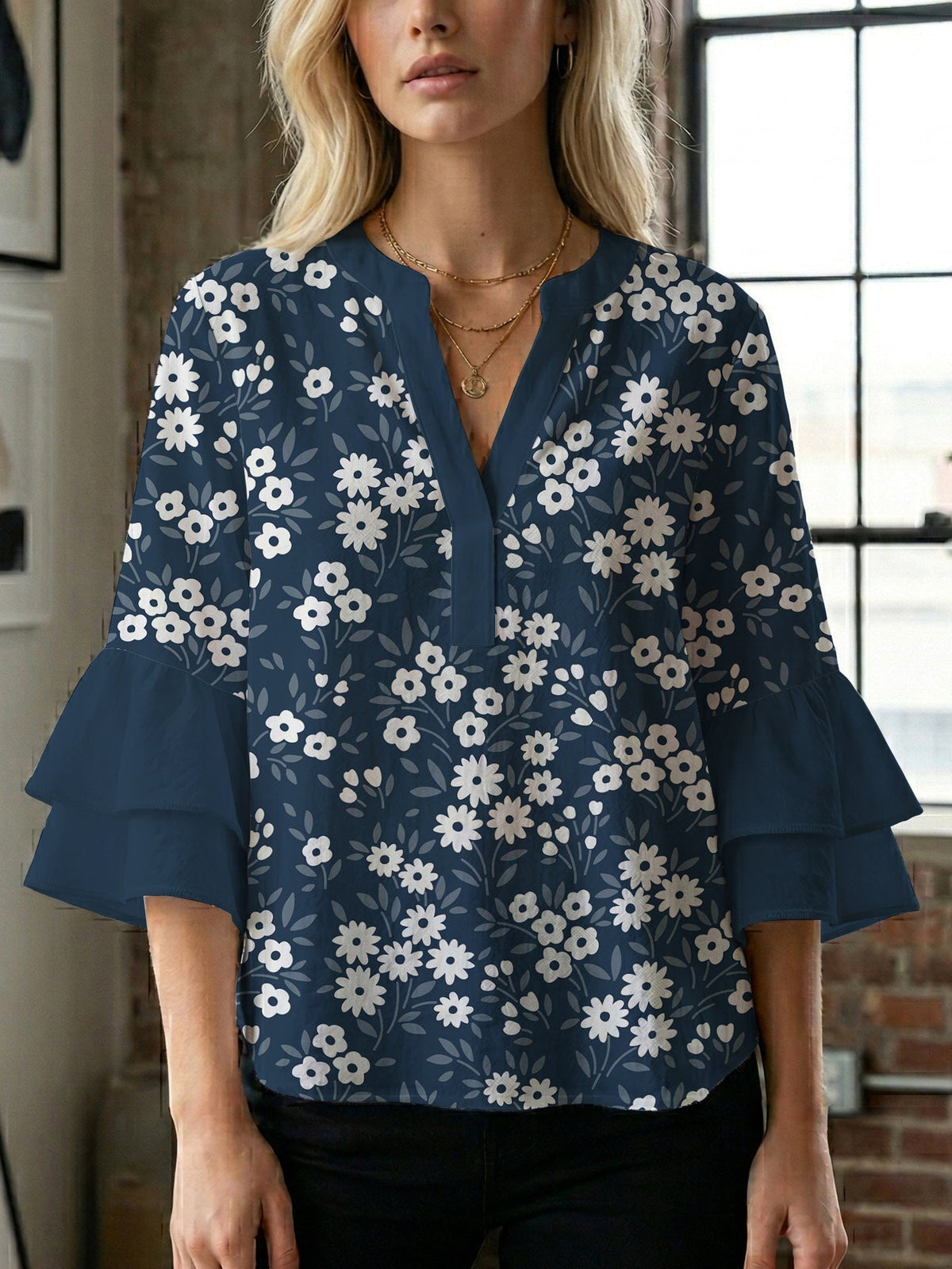 Women's Blouse with Voluminous Sleeves and Floral Design