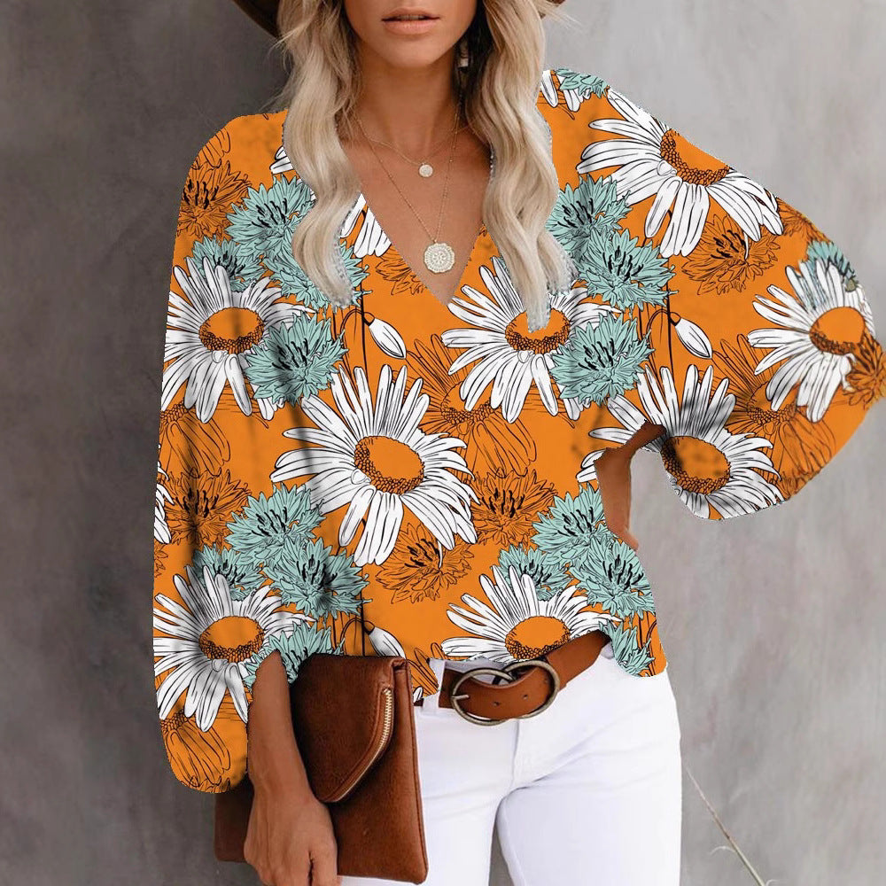 Women's Blouse with Wide Sleeves and Floral Pattern