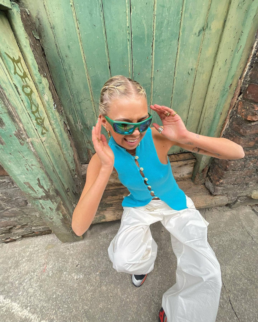 Women's Sleeveless Knit Top with Unique Button Placket