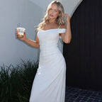 Elegant Floor-Length Dress with Unique Draping