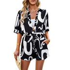 Women's Fashionable Belted Jumpsuit with Contrasting Patterns